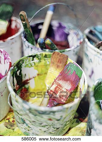 A Close-Up of messy buckets of paint and paintbrushes View Large Photo Image Stock Photography - A Close-Up of messy buckets of paint and paintbrushes. Fotosearch