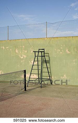 An umpire's chair on a tennis court View Large Photo Image Stock Photography - An umpire's chair on a tennis court. Fotosearch