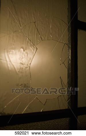 A broken window View Large Photo Image Stock Image - A broken window. Fotosearch