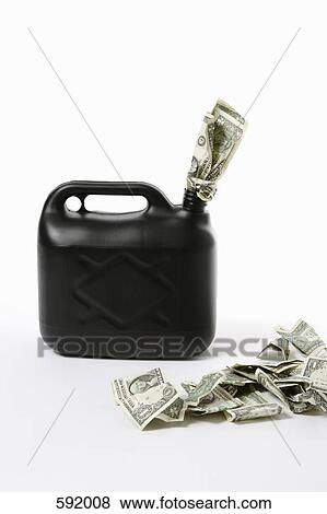 A petrol can with dollar bills View Large Photo Image Stock Photo - A petrol can with dollar bills. Fotosearch