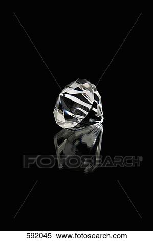 A studio shot of a diamond-shaped crystal prism View Large Photo Image Stock Photography - A studio shot of a diamond-shaped crystal prism. Fotosearch