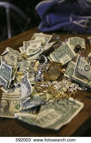 Crumpled banknotes and jewelry View Large Photo Image Stock Image - Crumpled banknotes and jewelry. Fotosearch