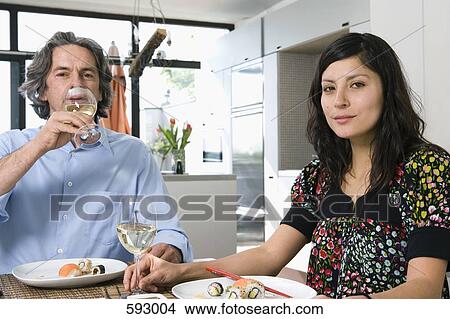 A couple having dinner together View Large Photo Image Picture - A couple having dinner together. Fotosearch