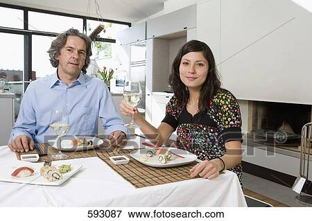 A couple having dinner together View Large Photo Image Stock Photo - A couple having dinner together. Fotosearch