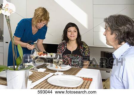 A dinner party View Large Photo Image Picture - A dinner party. Fotosearch