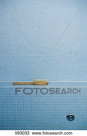 A plant in a blue tiled bathroom View Large Photo Image Stock Image - A plant in a blue tiled bathroom. Fotosearch