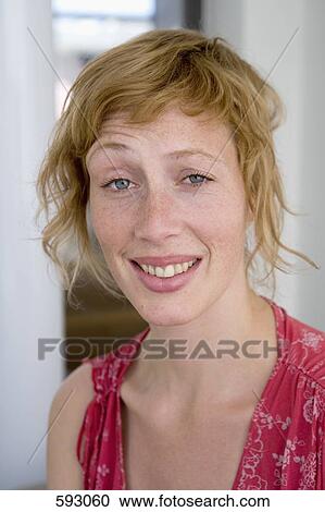 Stock Image - A woman with raised eyebrows. Fotosearch
