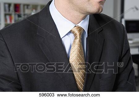Stock Image - Midsection of a businessman. Fotosearch