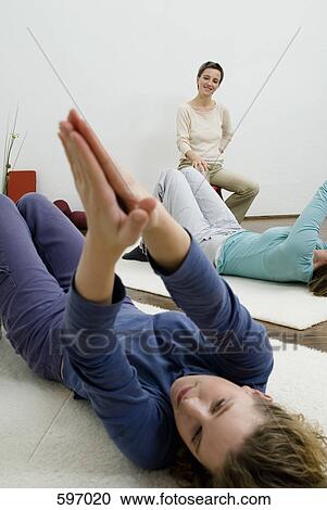 A yoga class with instructor View Large Photo Image Stock Image - A yoga class with instructor. Fotosearch
