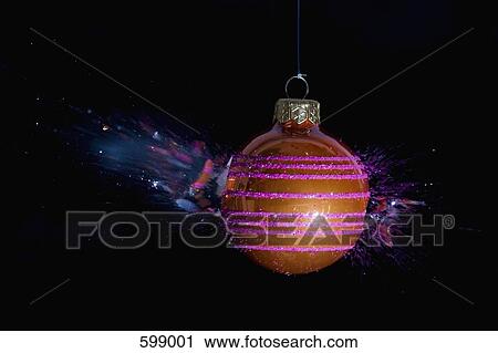 An exploding Christmas bauble View Large Photo Image Stock Image - An exploding Christmas bauble. Fotosearch