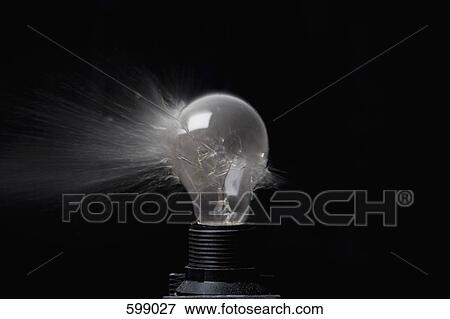 An exploding light bulb View Large Photo Image Stock Photo - An exploding light bulb. Fotosearch