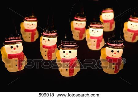 Illuminated snowmen View Large Photo Image Stock Photo - Illuminated snowmen. Fotosearch