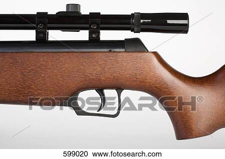 Stock Image - Midsection of a rifle. Fotosearch