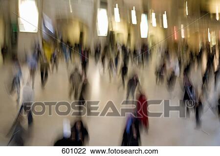 Blurred view of people walking View Large Photo Image Stock Image - Blurred view of people walking. Fotosearch
