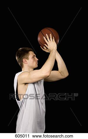 Stock Image - A basketball player. Fotosearch