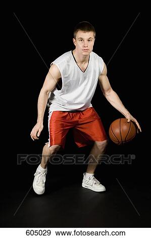 A basketball player View Large Photo Image Stock Photo - A basketball player. Fotosearch