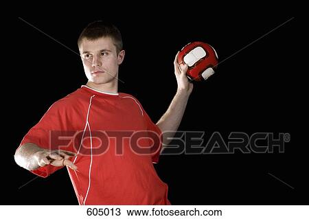 A man playing handball View Large Photo Image Stock Image - A man playing handball. Fotosearch