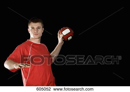 A man playing handball View Large Photo Image Stock Image - A man playing handball. Fotosearch