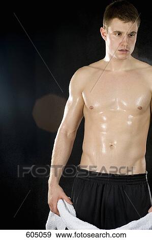 A shirtless man sweating View Large Photo Image Stock Photo - A shirtless man sweating. Fotosearch