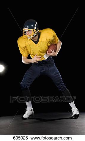 An American football player View Large Photo Image Stock Photography - An American football player. Fotosearch