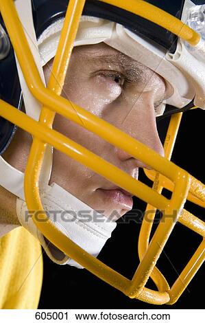 Stock Image - Headshot of an American Football player. Fotosearch