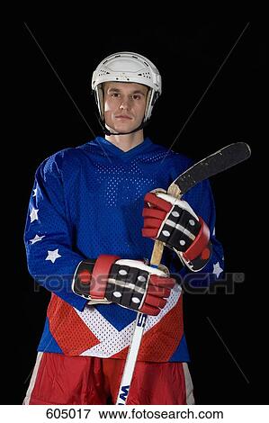 Stock Photo - Portrait of an ice hockey player. Fotosearch