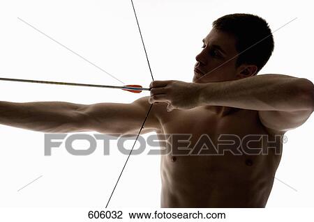 Silhouette of archer pulling an arrow back on his longbow View Large Photo Image Stock Image - Silhouette of archer pulling an arrow back on his longbow. Fotosearch