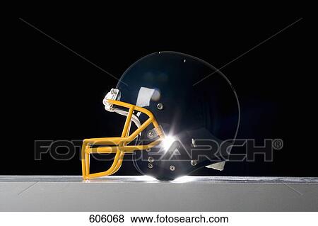 Still life studio shot of a American football helmet View Large Photo Image Stock Photo - Still life studio shot of a American football helmet. Fotosearch