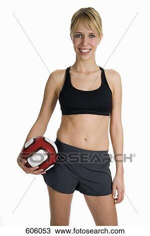 Studio portrait of a female volleyball player View Large Photo Image Stock Image - Studio portrait of a female volleyball player. Fotosearch
