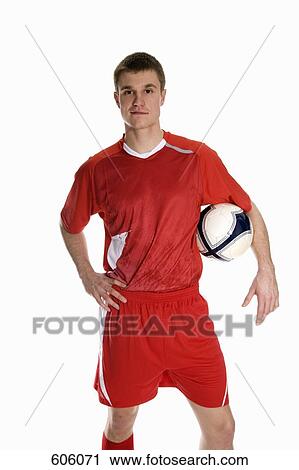 studio Portrait of a soccer player holding a soccer ball View Large Photo Image Stock Image - studio Portrait of a soccer player holding a soccer ball. Fotosearch