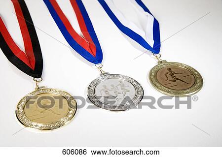 Studio shot of a gold medal, silver medal and a bronze medal View Large Photo Image Stock Photograph - Studio shot of a gold medal, silver medal and a bronze medal. Fotosearch