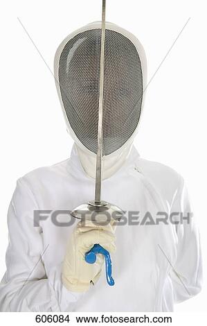 Studio shot of female fencer posing with a fencing foil View Large Photo Image Picture - Studio shot of female fencer posing with a fencing foil. Fotosearch
