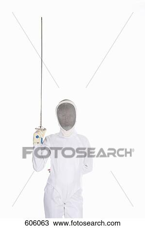 Studio shot of female fencer posing with a fencing foil View Large Photo Image Stock Image - Studio shot of female fencer posing with a fencing foil. Fotosearch
