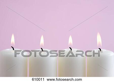 Four burning candles in a row View Large Photo Image Stock Image - Four burning candles in a row. Fotosearch