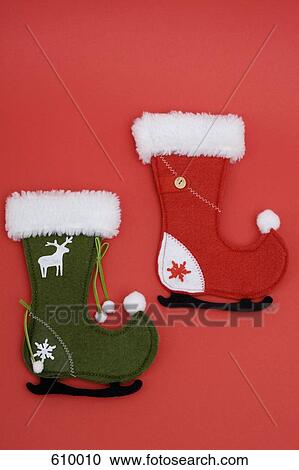 Two Christmas stocking decorations View Large Photo Image Stock Image - Two Christmas stocking decorations. Fotosearch