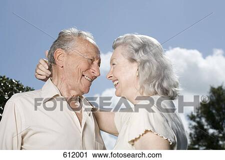 A senior couple embracing View Large Photo Image Stock Image - A senior couple embracing. Fotosearch