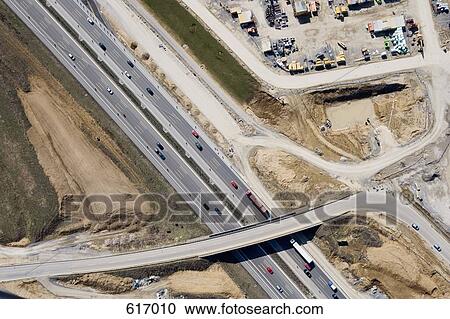 Aerial view of a construction site and motorway View Large Photo Image Stock Image - Aerial view of a construction site and motorway. Fotosearch