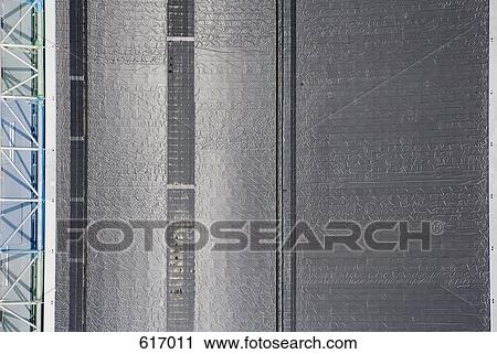 Stock Image - Aerial view of a construction site and motorway. Fotosearch