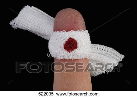 A bleeding finger wrapped in a bandage View Large Photo Image Stock Photography - A bleeding finger wrapped in a bandage. Fotosearch