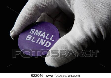 A gloved hand holding a gambling chip View Large Photo Image Stock Photograph - A gloved hand holding a gambling chip. Fotosearch