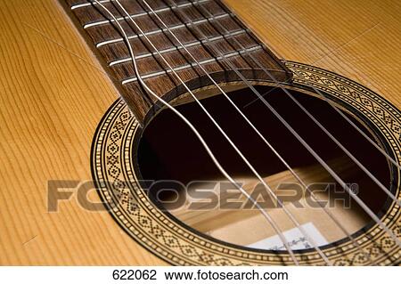 A guitar with a broken string View Large Photo Image Stock Image - A guitar with a broken string. Fotosearch