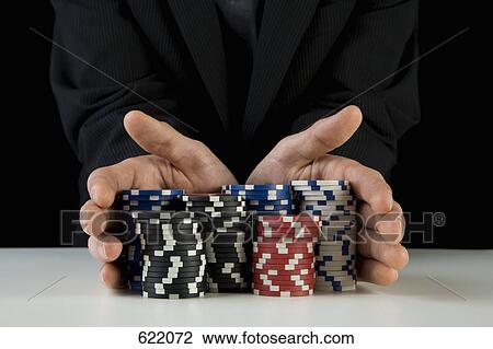 A man with gambling chips View Large Photo Image Stock Image - A man with gambling chips. Fotosearch