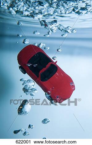 A toy car in water View Large Photo Image Stock Image - A toy car in water. Fotosearch