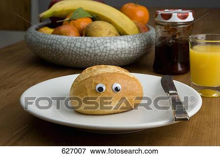 A bread bun with eyeballs for breakfast View Large Photo Image Stock Photo - A bread bun with eyeballs for breakfast. Fotosearch