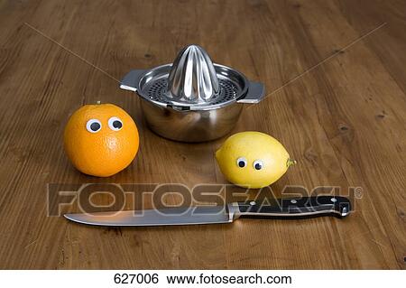 Fruit, a juicer and a kitchen knife View Large Photo Image Stock Photograph - Fruit, a juicer and a kitchen knife. Fotosearch