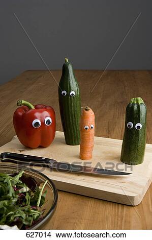 Picture - Vegetables with anthropomorphic faces. Fotosearch