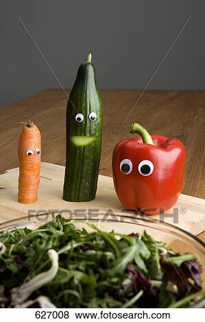 Stock Photo - Vegetables with anthropomorphic faces. Fotosearch