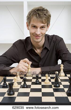A man playing chess View Large Photo Image Stock Photography - A man playing chess. Fotosearch