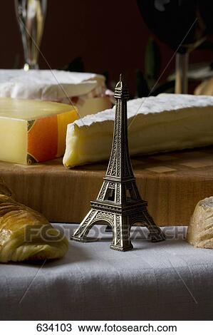 Close Up of Eiffel Tower souvenir and French cheeses View Large Photo Image Stock Image - Close Up of Eiffel Tower souvenir and French cheeses. Fotosearch