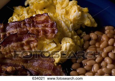 Close Up still life of stereotypical English breakfast View Large Photo Image Stock Image - Close Up still life of stereotypical English breakfast. Fotosearch